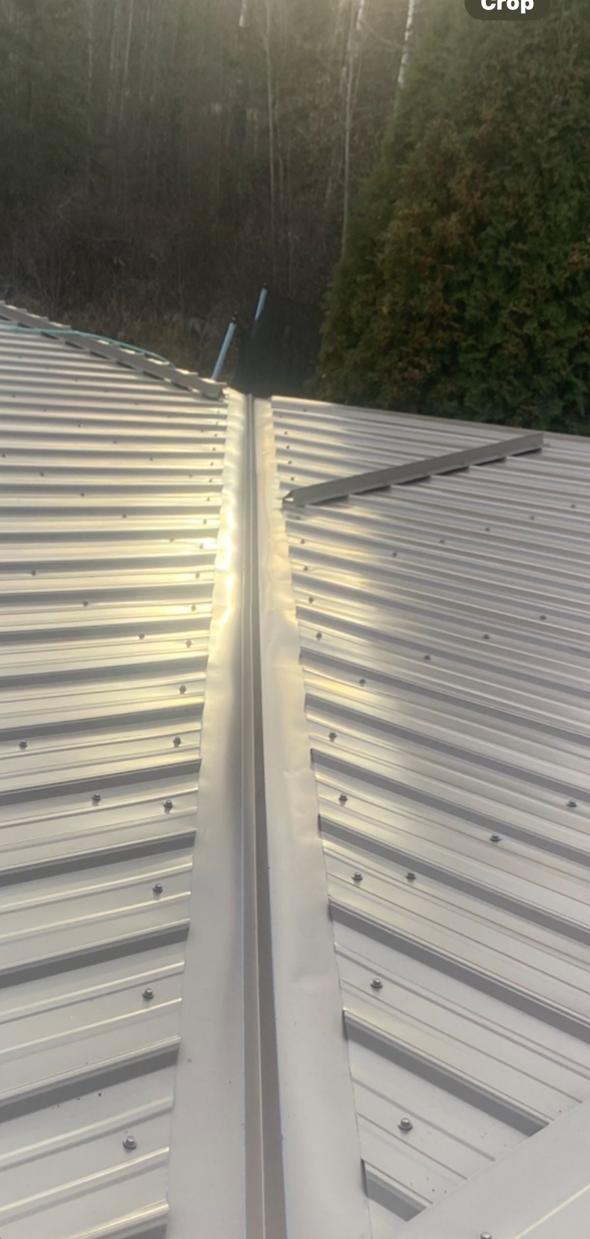 Close-up of metal roofing product finish showing color and texture quality