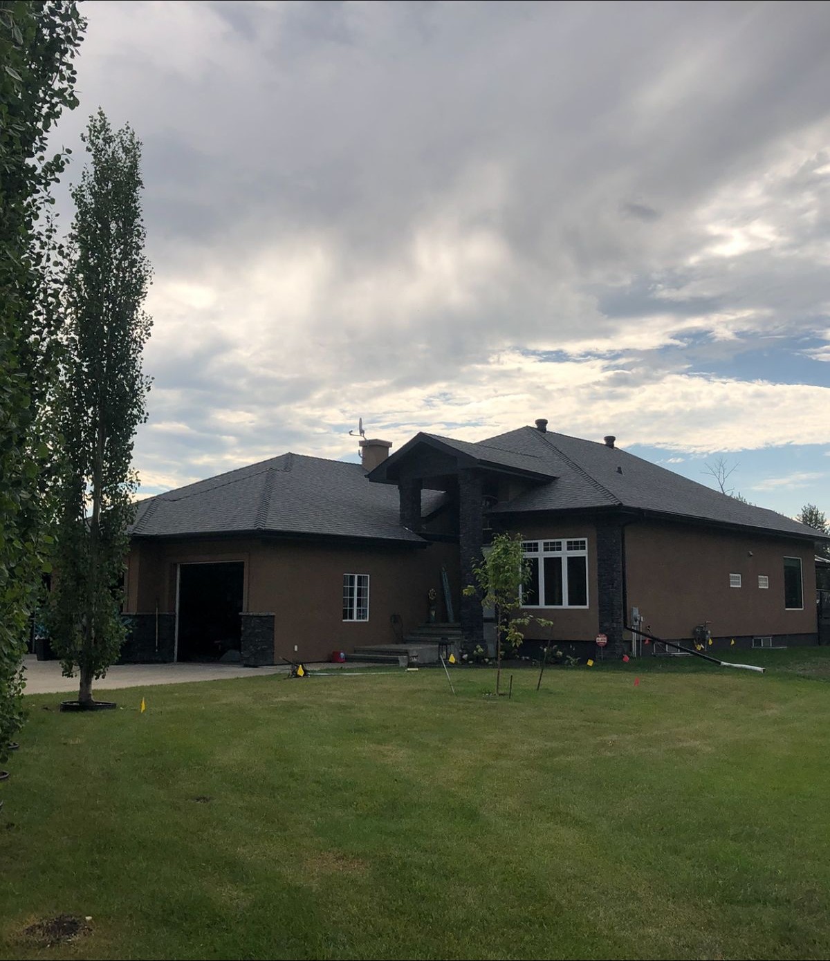 Completed steel siding job on a residential home near Spruce Grove Alberta