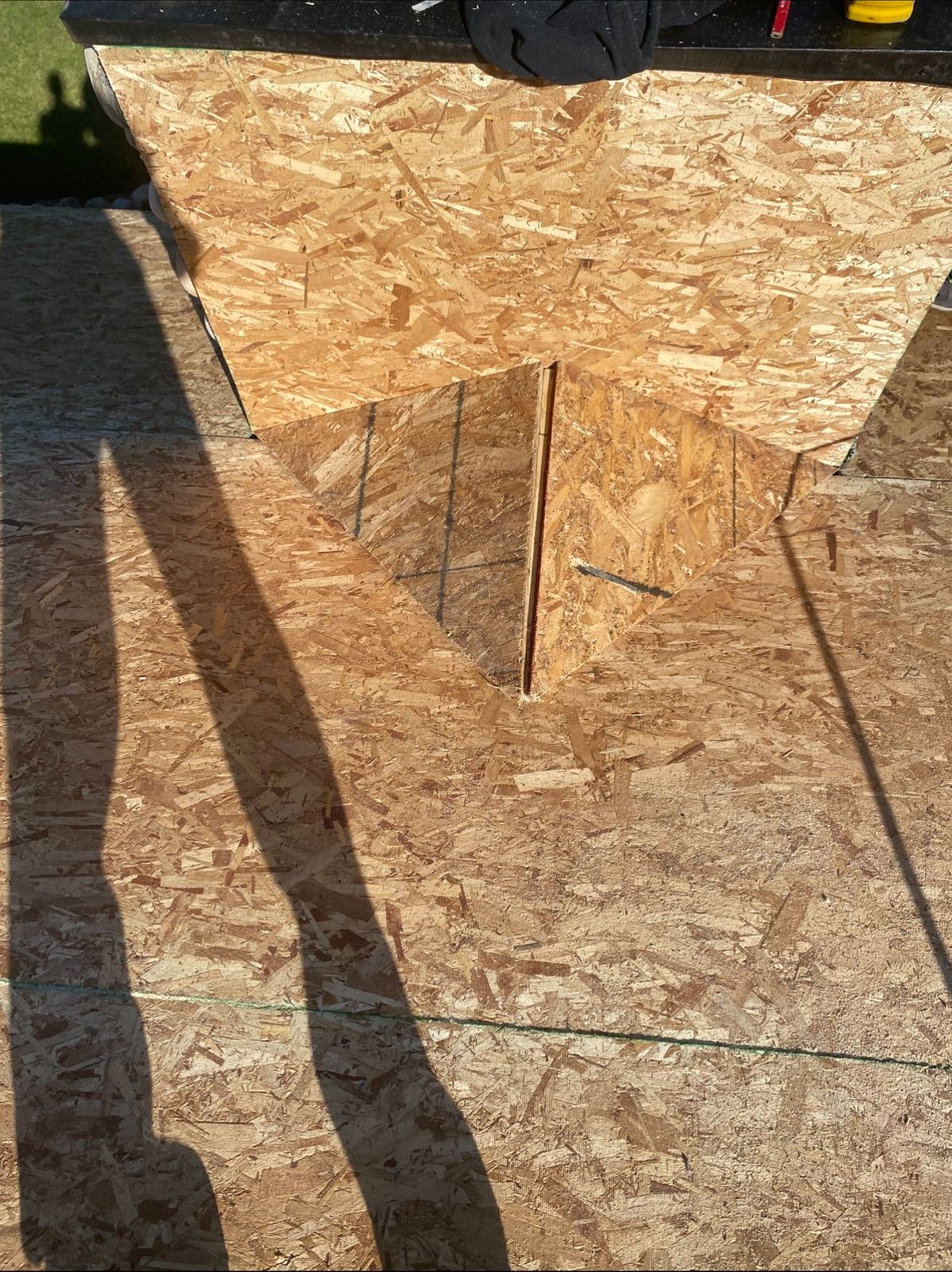 Completed residential shingling project with clean ridge lines